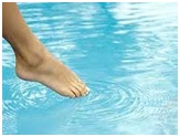 toe dipping in water