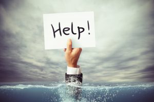 hand holding a help sign