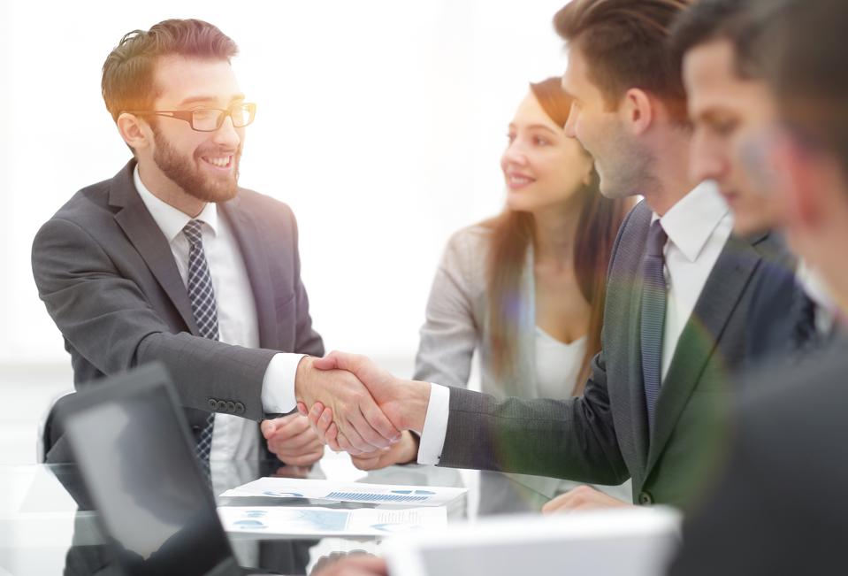 closing the deal two men shaking hands