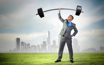 businessman lifting weight