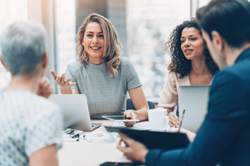 a group of professionals in a meeting