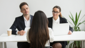 man and woman doing an interview